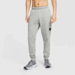 Tepláky NIKE Dri-FIT Men's Tapered Tra Grey